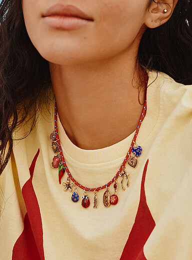 Whimsical charm cord necklace