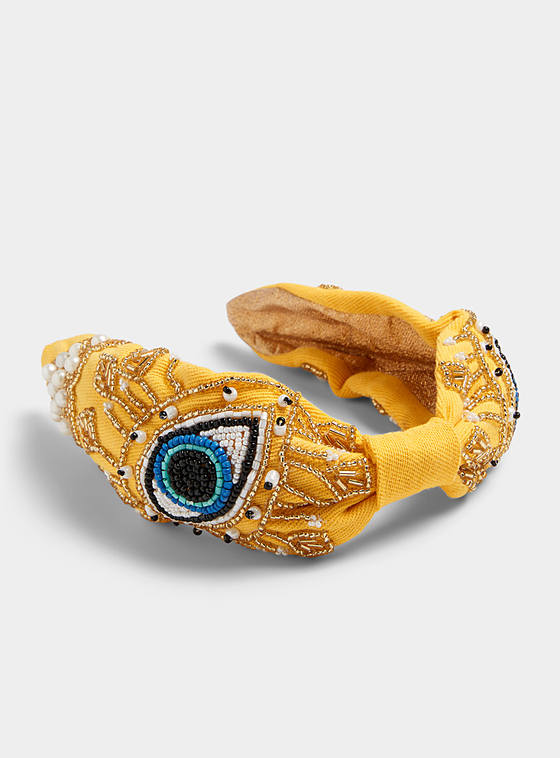 Simons Patterned Yellow Piercing-eyes knotted headband for women