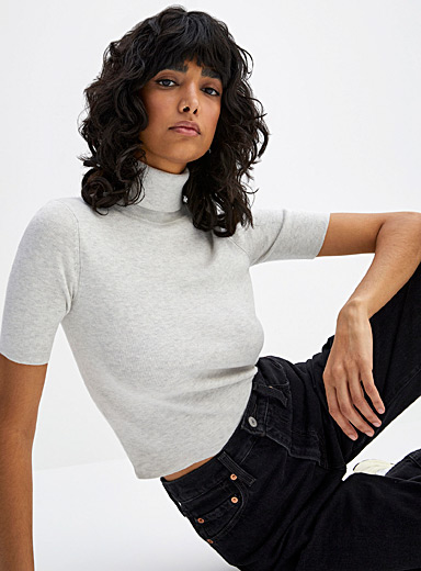 https://imagescdn.simons.ca/images/16903-213893-6-A1_3/solid-colour-short-sleeve-turtleneck-sweater.jpg?__=16