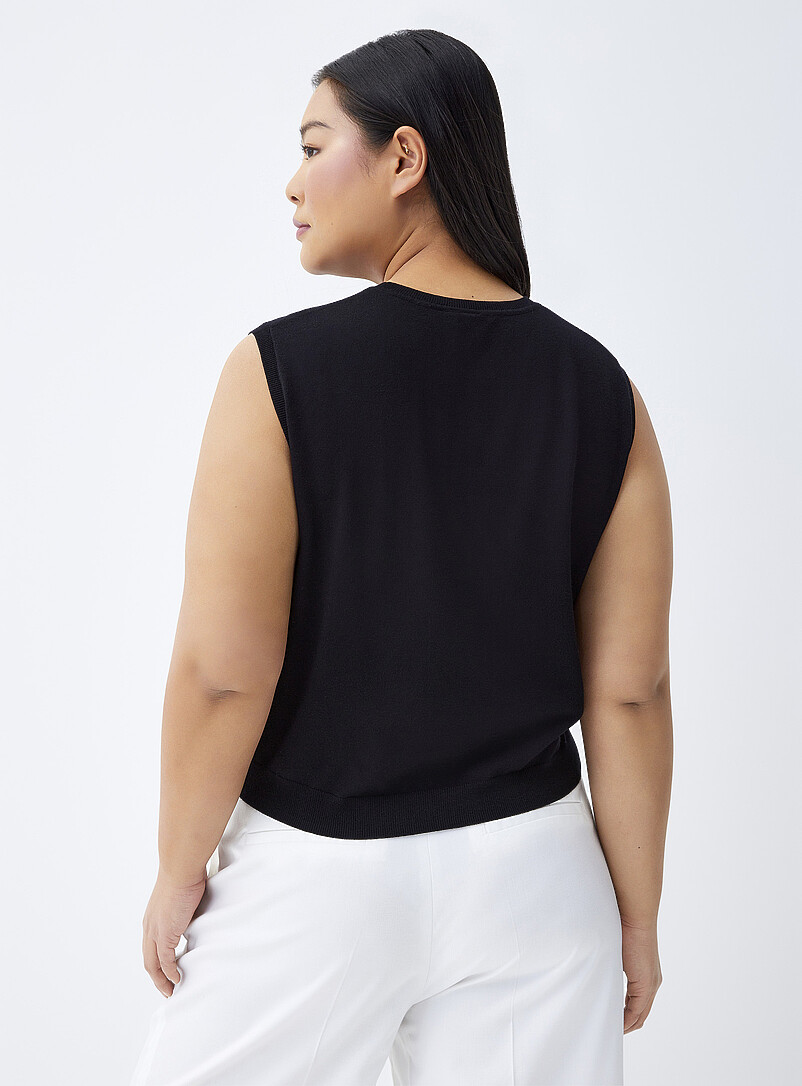 Twik Pink Solid fine knit sweater vest for women