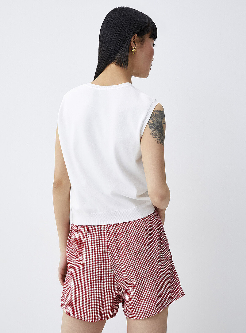 Twik Pink Solid fine knit sweater vest for women