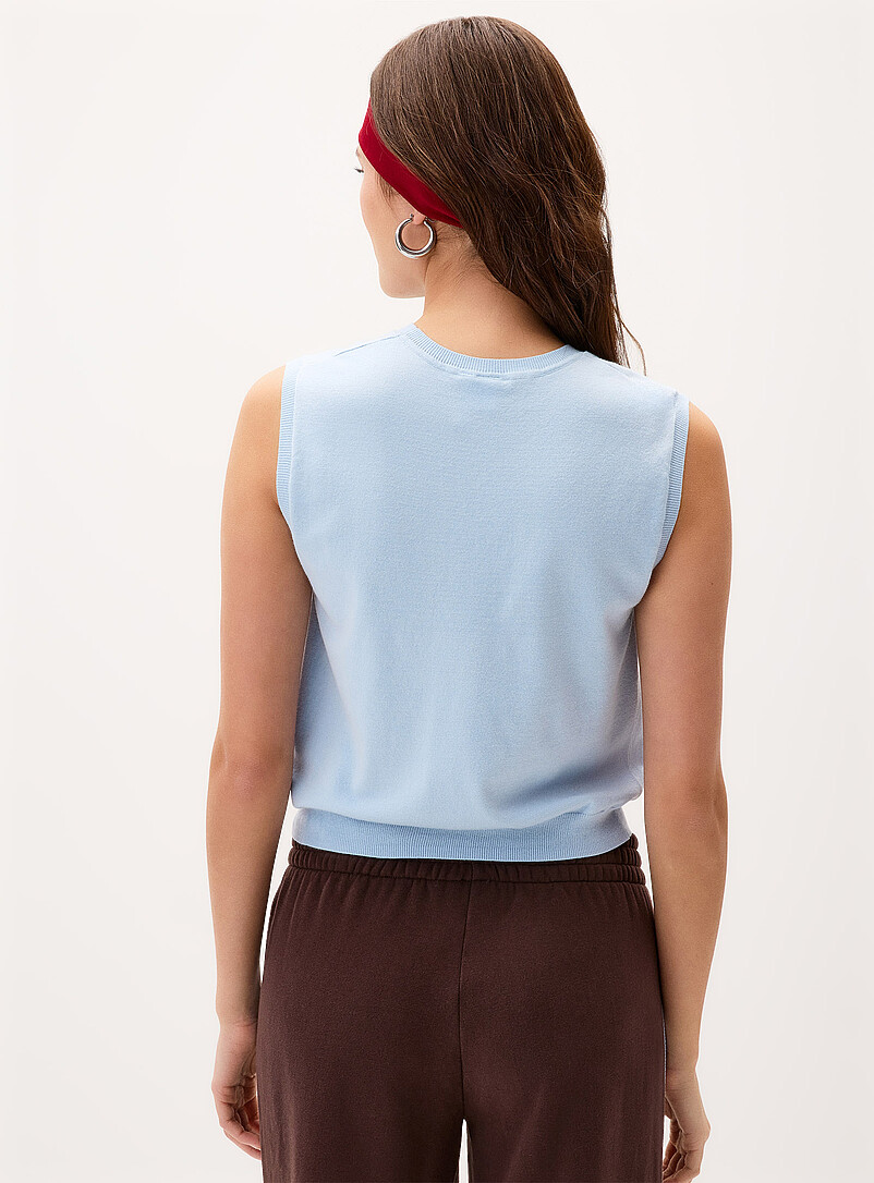 Twik Pink Solid fine knit sweater vest for women