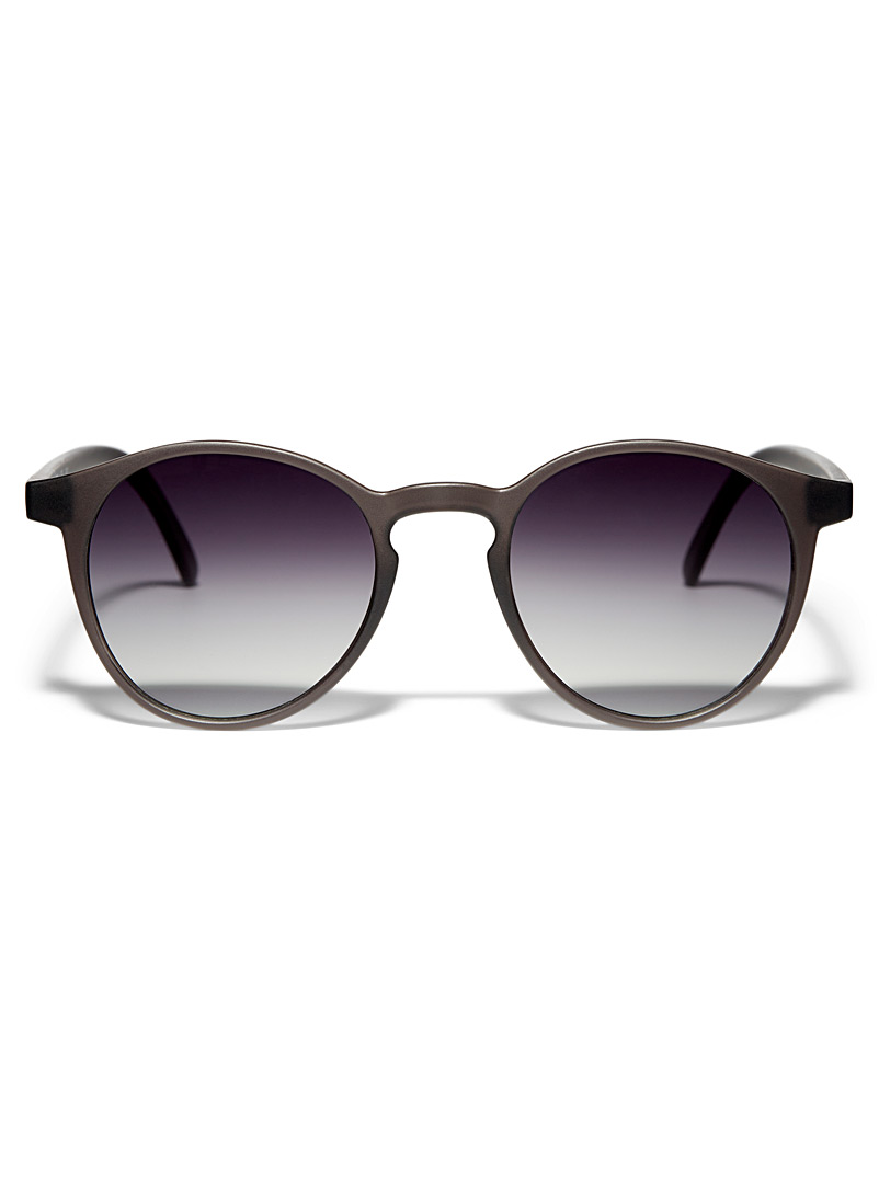 Mize: Les lunettes de soleil rondes C01 Noir pour femme