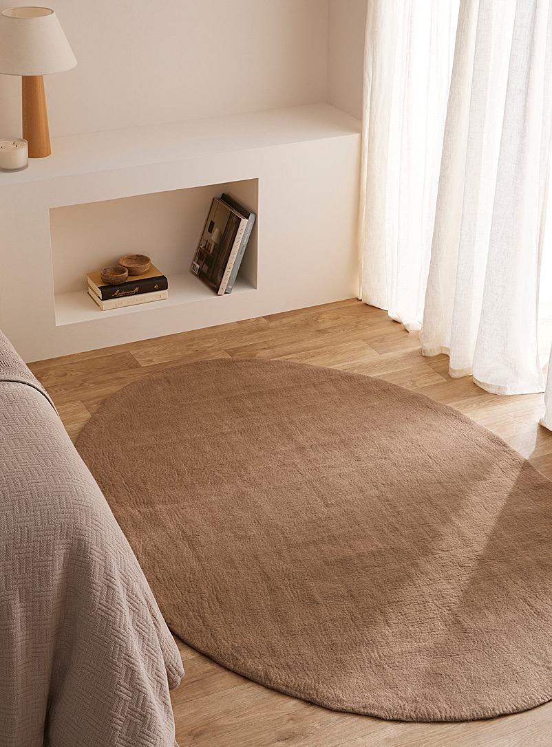 Simons Maison: Le tapis laine ovale uni 120 x 180 cm Brun pâle-taupe