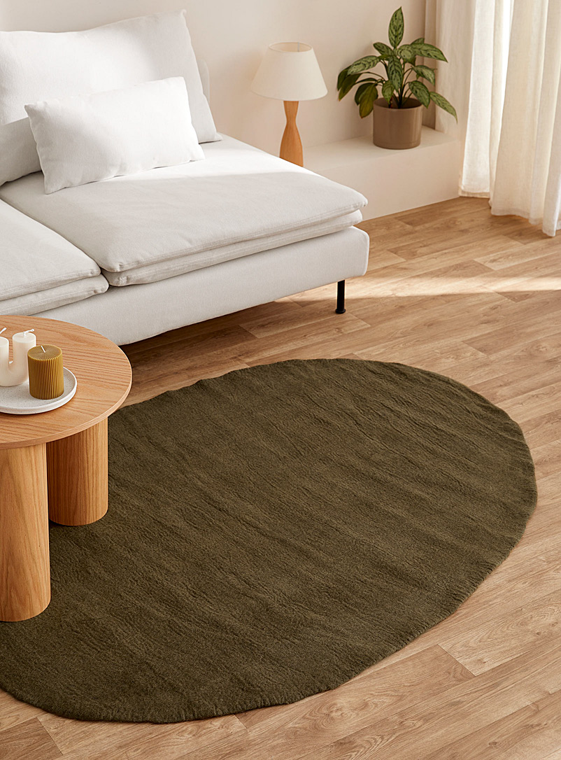 Simons Maison: Le tapis laine ovale uni 120 x 180 cm Vert foncé-mousse-olive