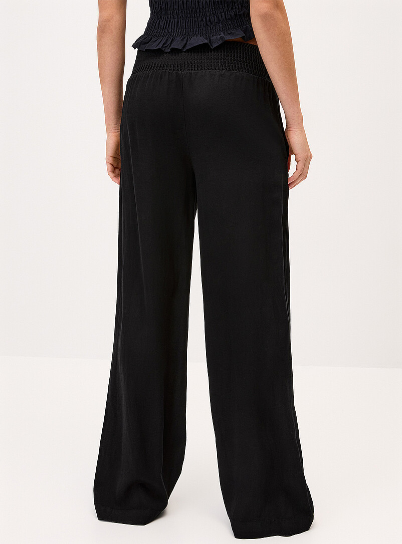 Twik: Le pantalon large taille smock&eacute;e Bleu p&acirc;le pour femme