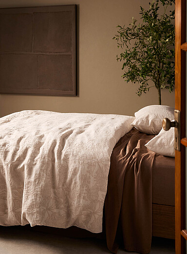 L'ensemble housse ivoire fleurs en relief coton et lin