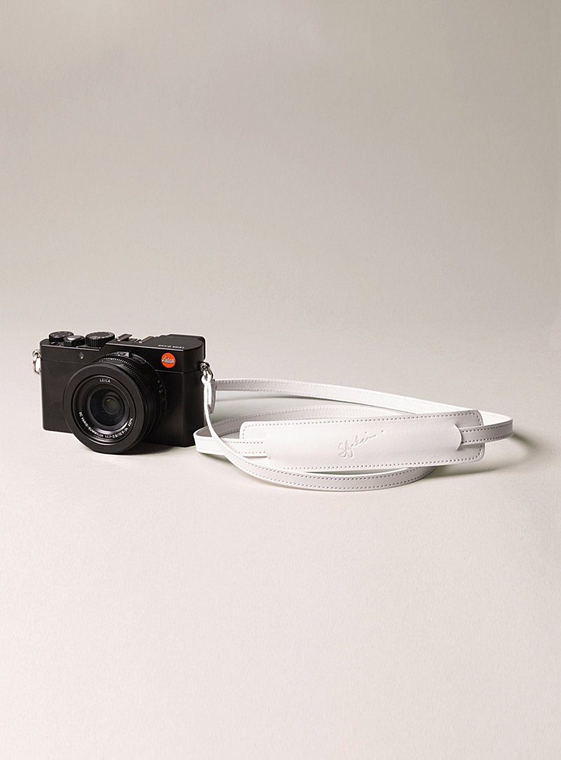 Sfalci: La lanière de caméra en cuir Blanc