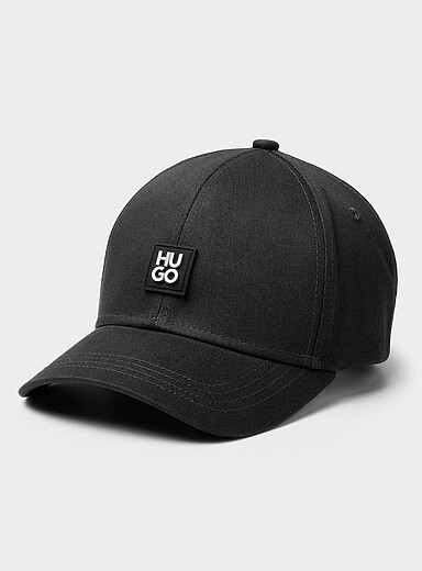 La casquette unie logo m&eacute;tallique