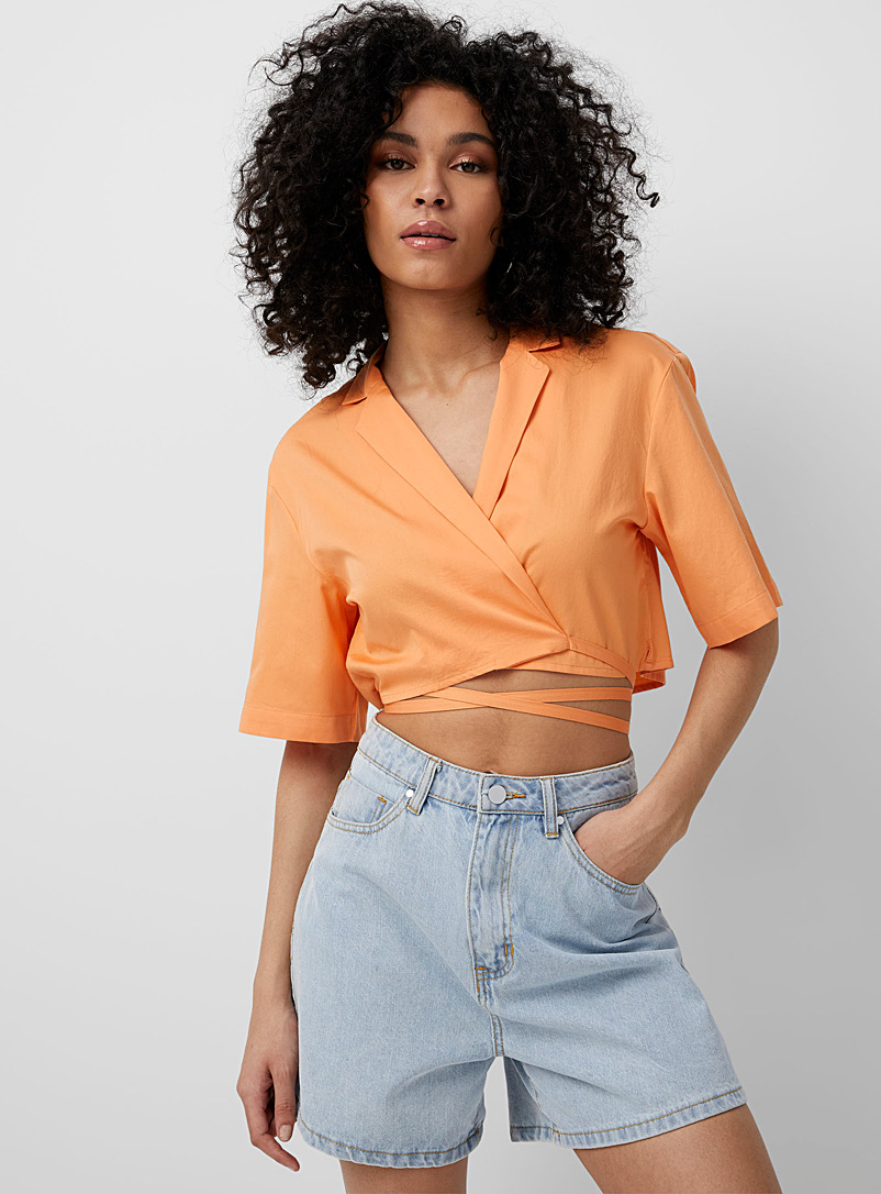 Icône: La blouse croisée taille nouée Orange pour femme