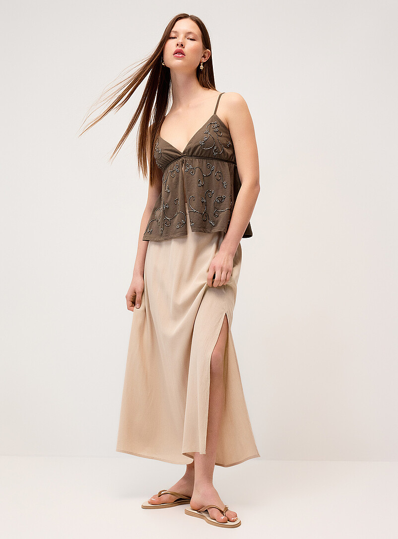 Twik: La jupe longue fendue cr&ecirc;pe textur&eacute; Soleils pour femme