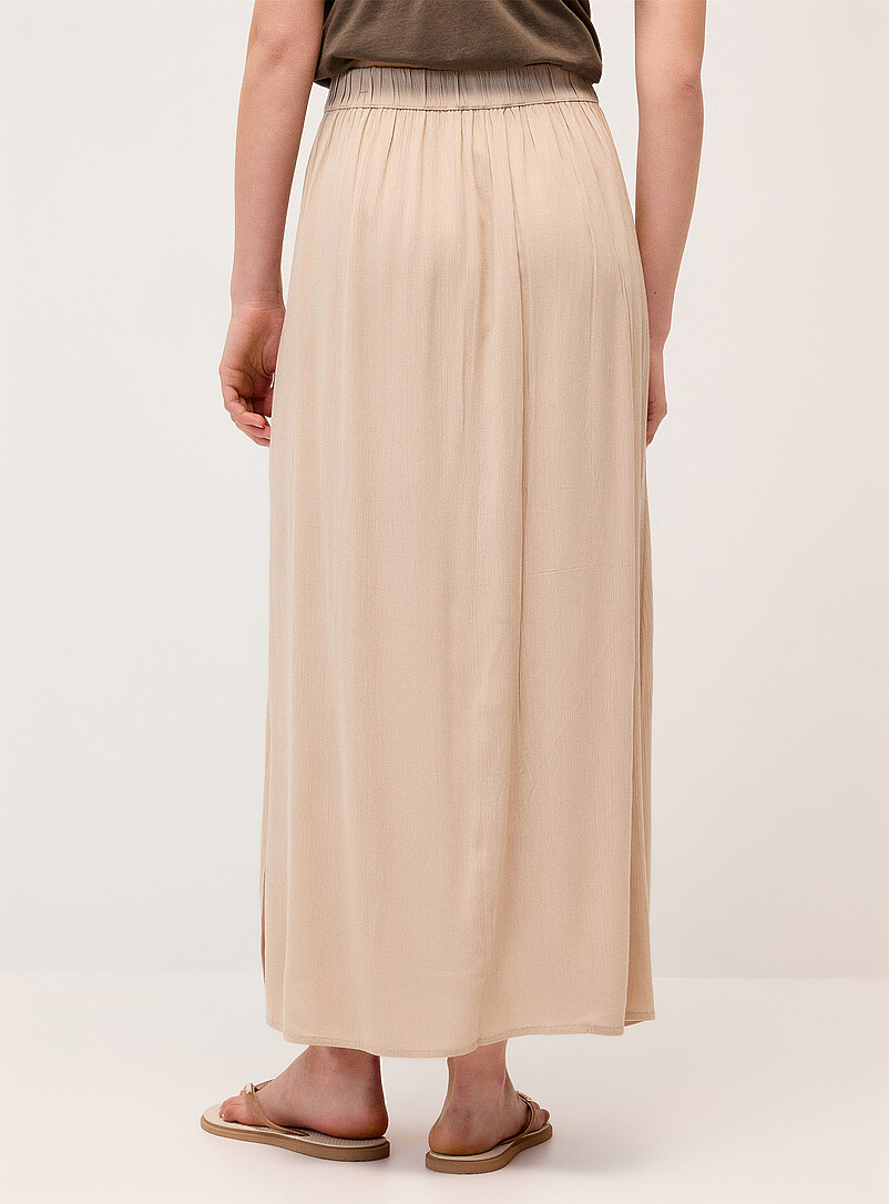 Twik: La jupe longue fendue cr&ecirc;pe textur&eacute; Soleils pour femme