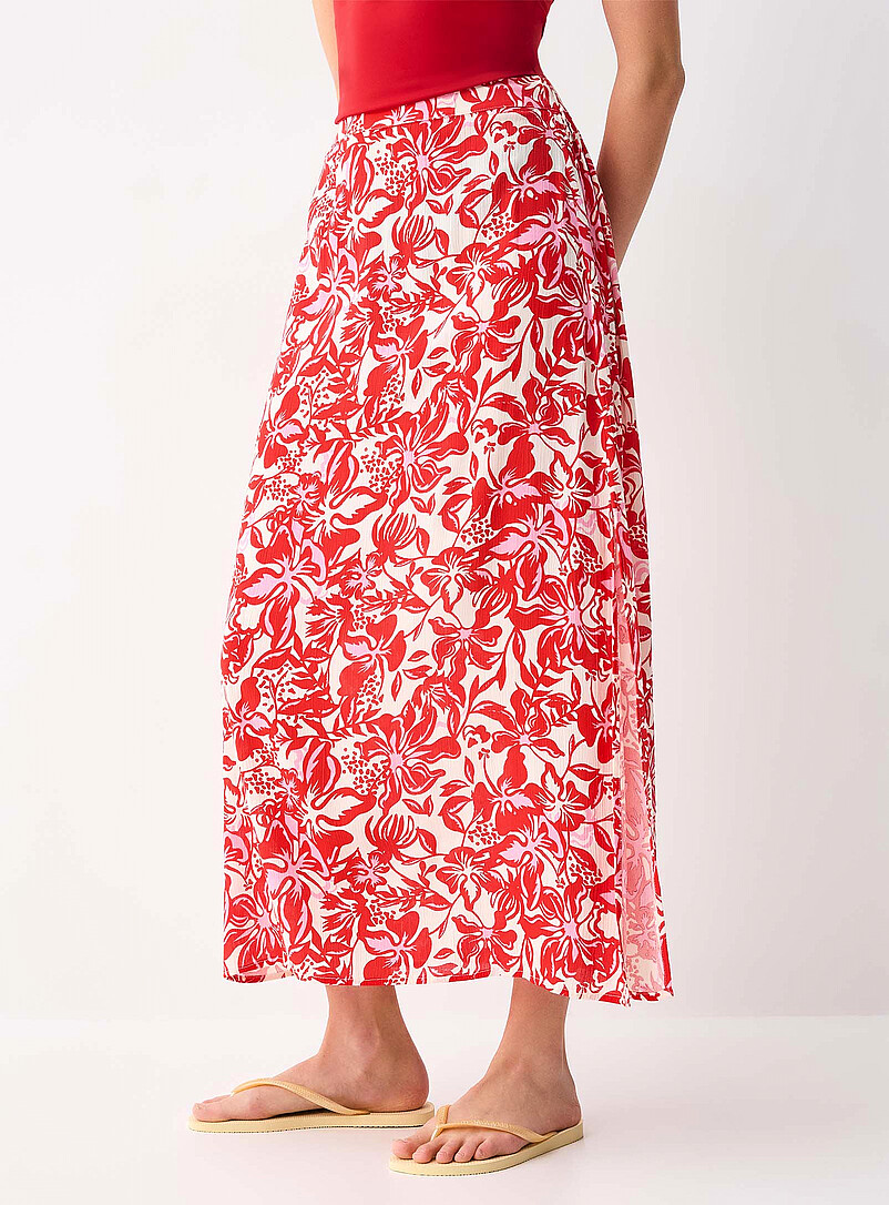 Twik: La jupe longue fendue cr&ecirc;pe textur&eacute; Soleils pour femme