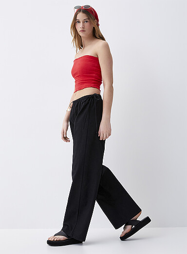 Twik: Le pantalon large taille &agrave; boucles Noir pour femme