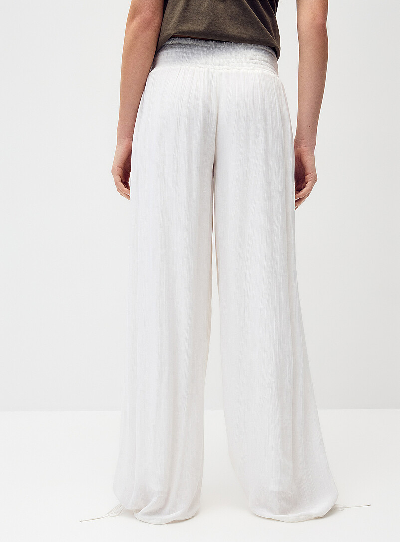 Twik Black Smocked-waist crinkled-finish pant for women