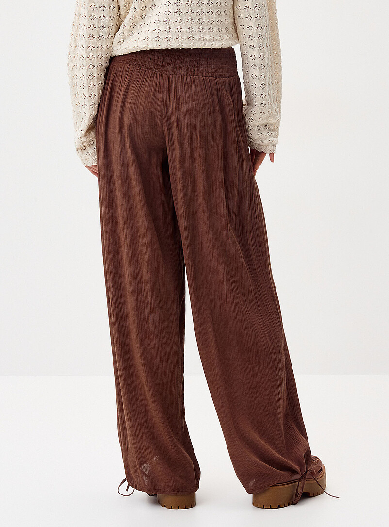 Twik Black Smocked-waist crinkled-finish pant for women