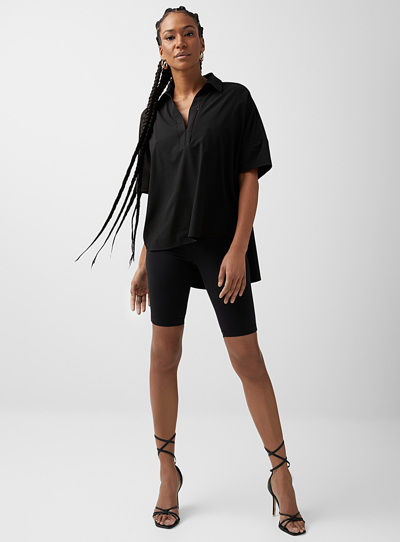 Icône: La blouse zip surdimensionnée Noir pour femme