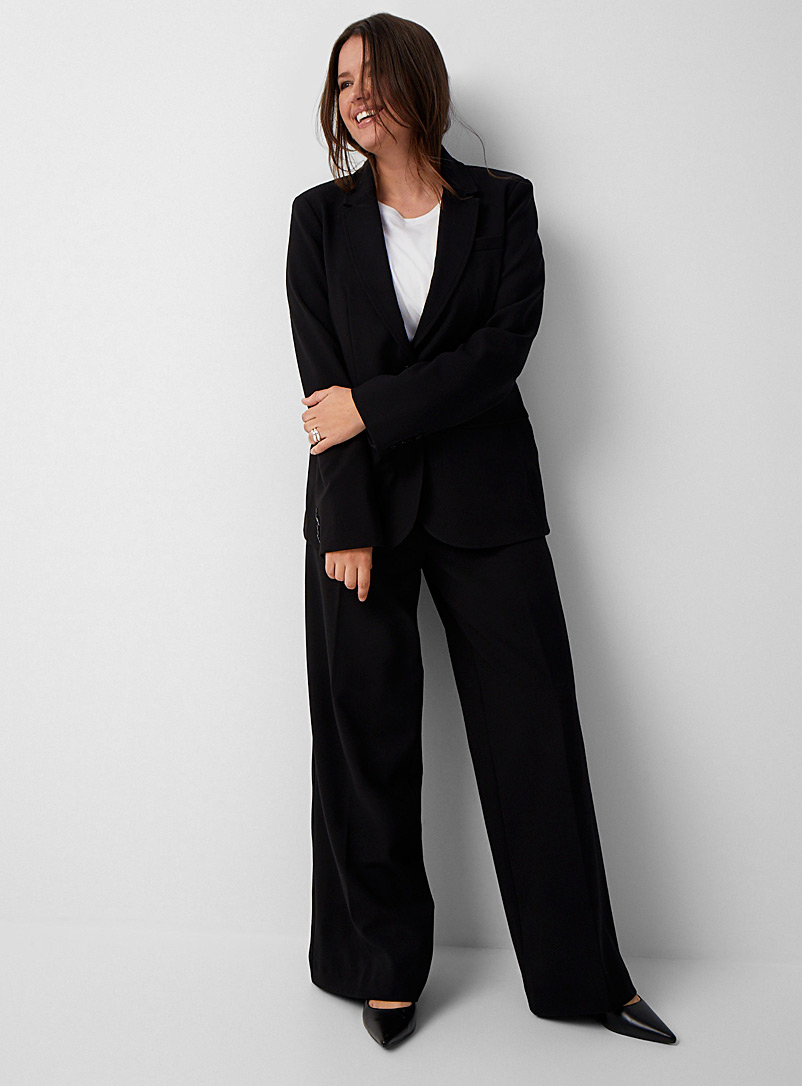 Contemporaine: Le pantalon large extensible taille haute Noir pour femme