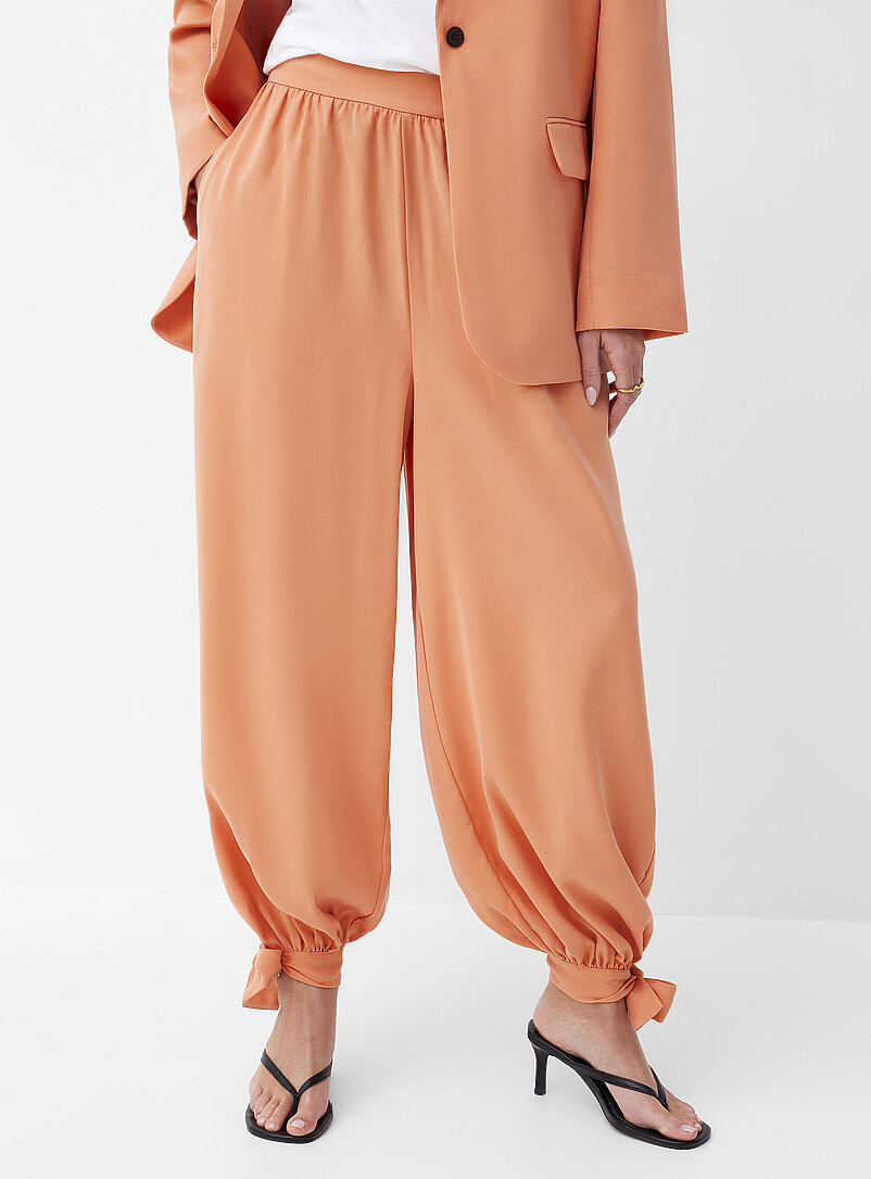 Ic&ocirc;ne: Le pantalon large et fluide chevilles &agrave; nouer P&ecirc;che pour femme