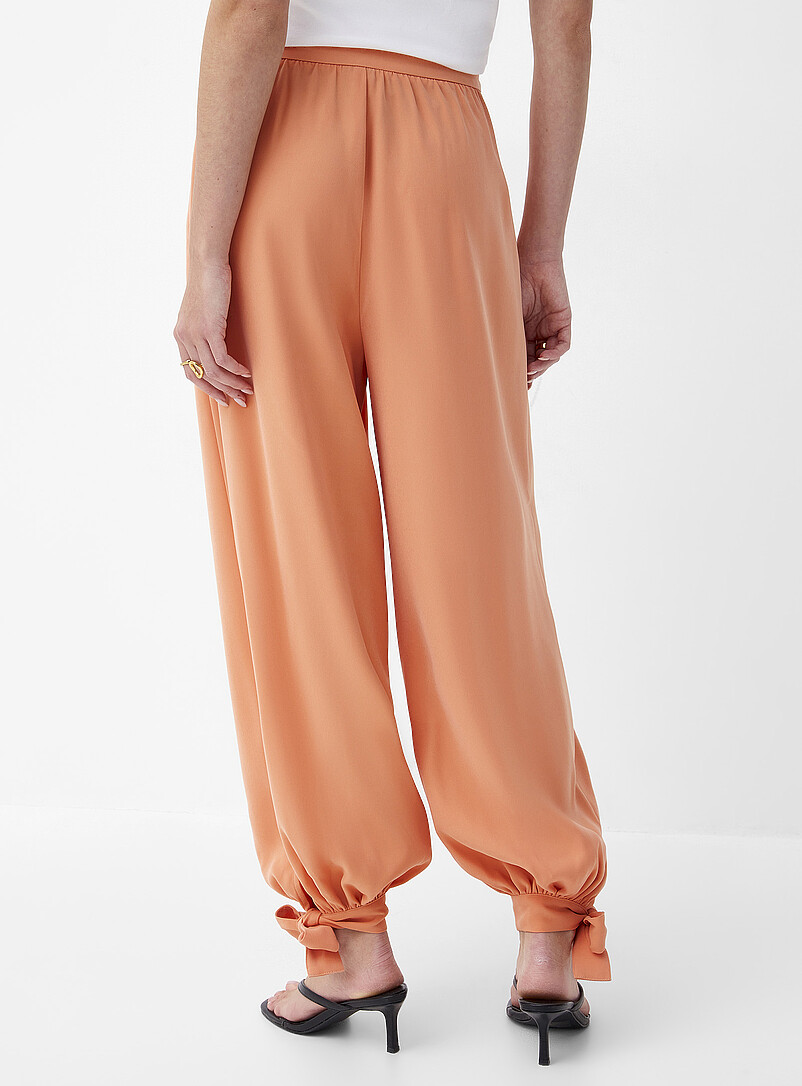 Ic&ocirc;ne: Le pantalon large et fluide chevilles &agrave; nouer P&ecirc;che pour femme