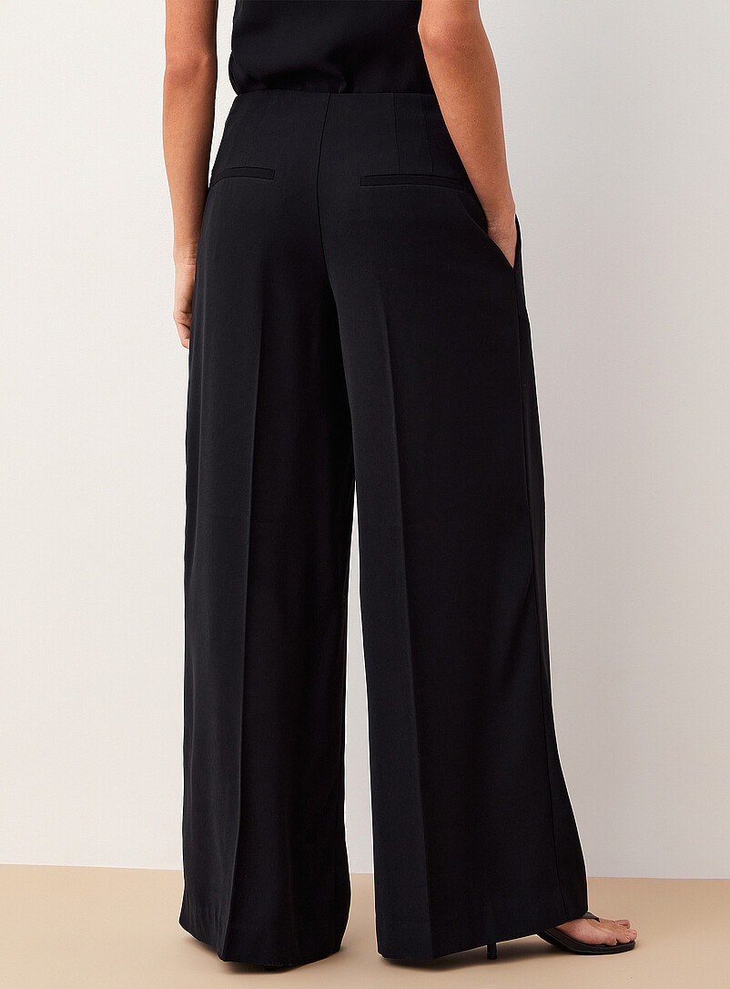 Ic&ocirc;ne: Le pantalon large et fluide ceintur&eacute; Blanc cass&eacute; pour femme