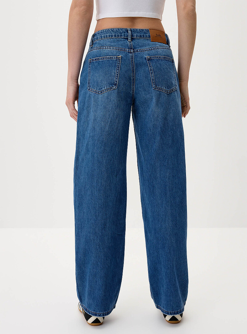 Twik: Le jean jambe large taille basse Blanc cass&eacute; pour femme