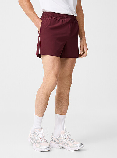 Piped stretch short without built-in brief Length: 4.5"