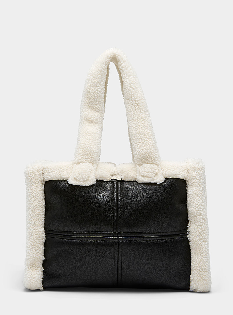 Stand Studio Black and White Lucille faux shearling tote for women