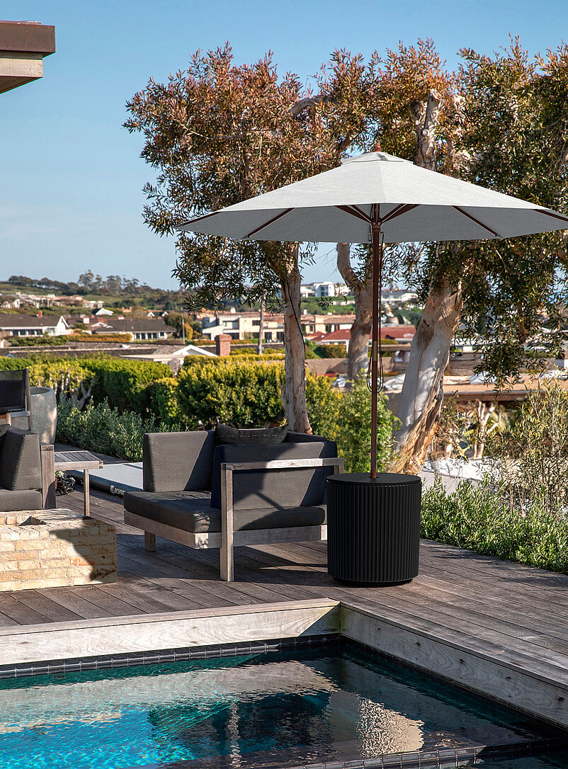 Demi grooved umbrella side table product image (primary)