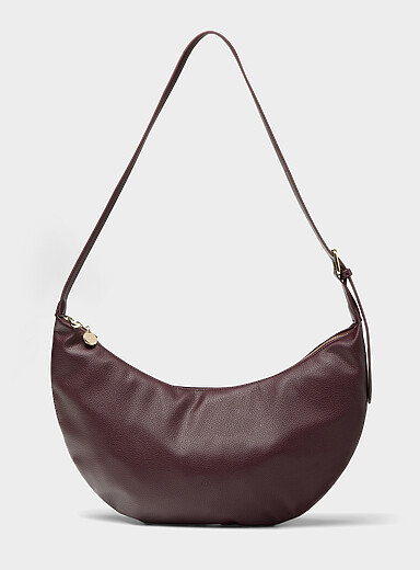 Le sac besace demi-lune minimaliste