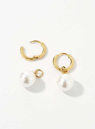 Les boucles d'oreilles perles miroitantes