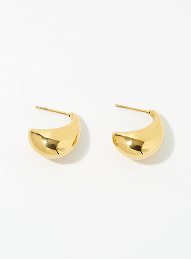 Les boucles d'oreilles d&ocirc;mes bomb&eacute;s