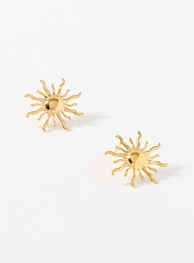Les boucles d'oreilles soleil radieux