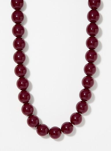 Le collier billes lustr&eacute;es