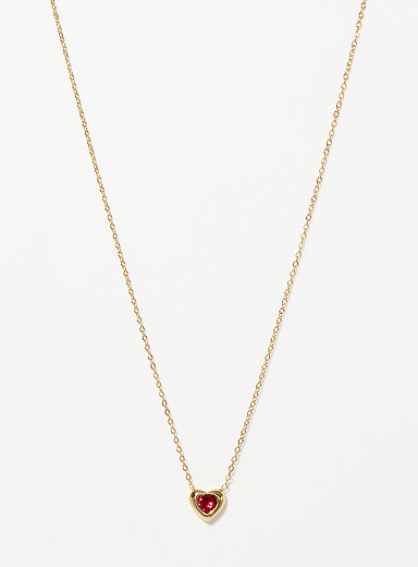 La cha&icirc;ne pendentif c&oelig;ur pierre de naissance