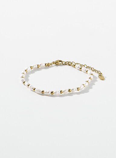 Le bracelet perles et billes dor&eacute;es