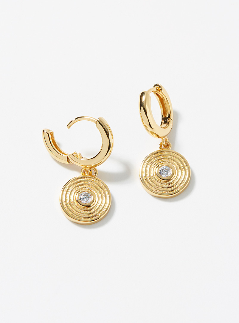 Petit moments. Assorted Gong-like earrings for women