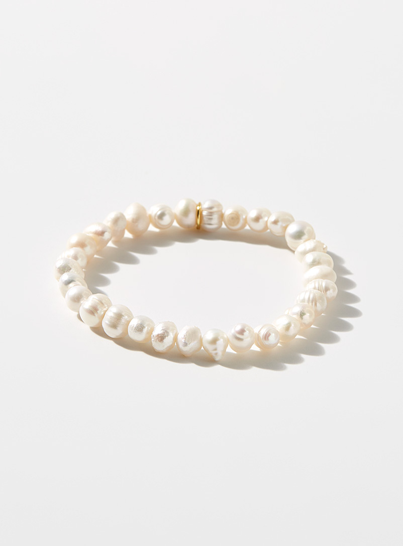 Petit moments. Ivory White Pearly bead and charm bracelet for women