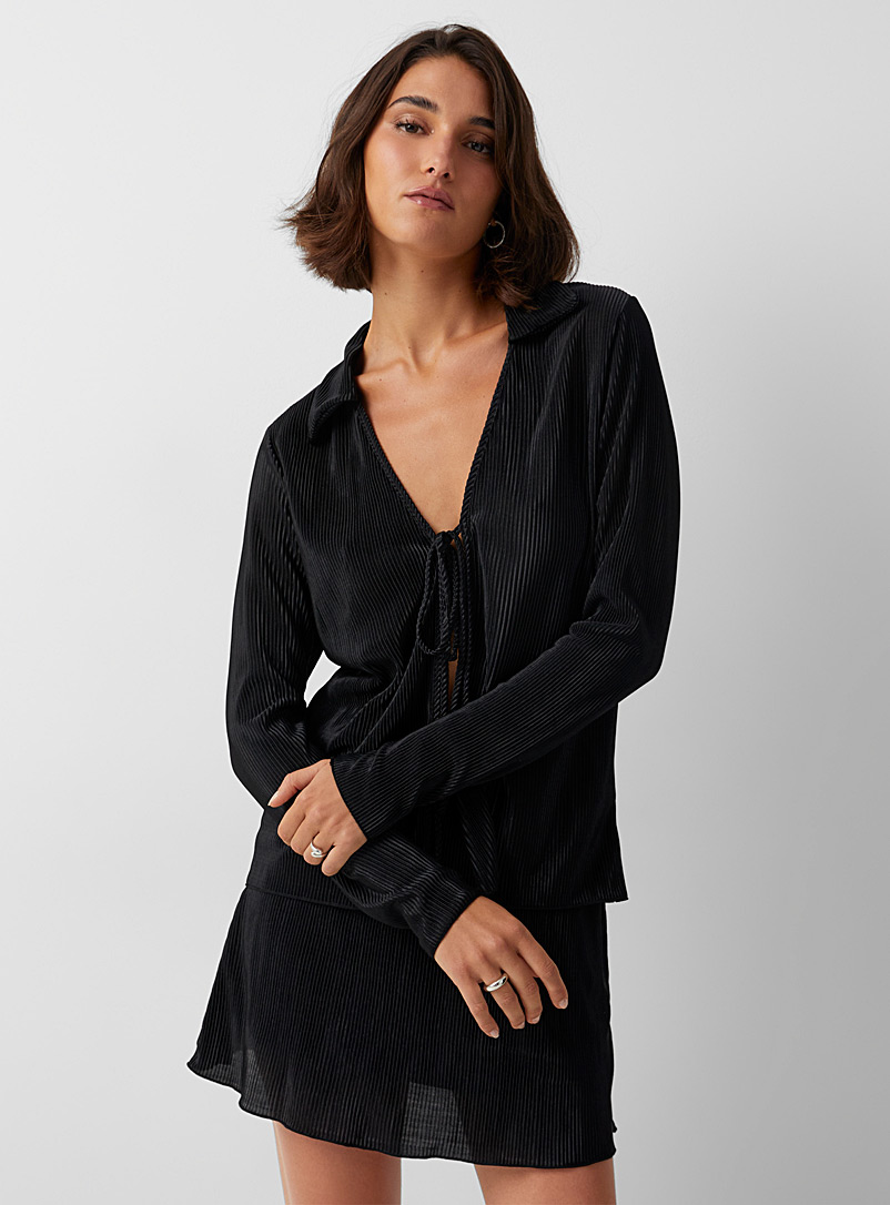 Icône: La blouse à nouer jersey plissé Noir pour femme