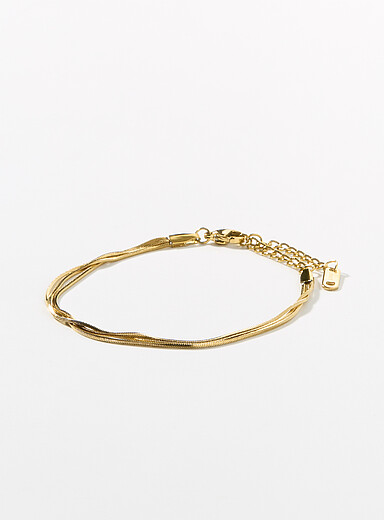 Le bracelet dor&eacute; trois rangs