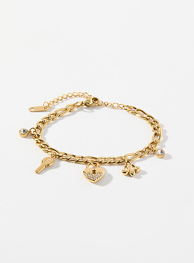 Le bracelet dor&eacute; breloques porte-bonheur