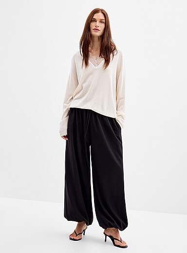 Le pantalon bouffant fluide <b>Coupe : jambe ample, taille haute</b>