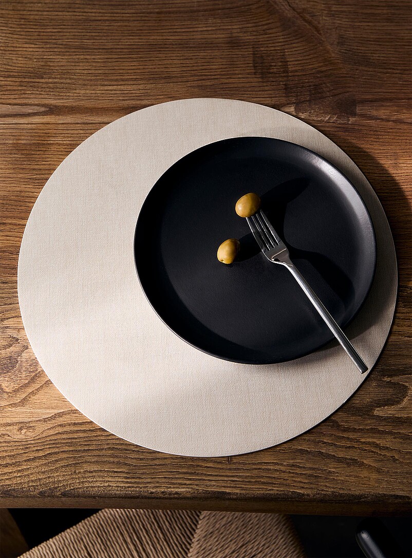 Round heathered faux-leather placemat product image (primary)