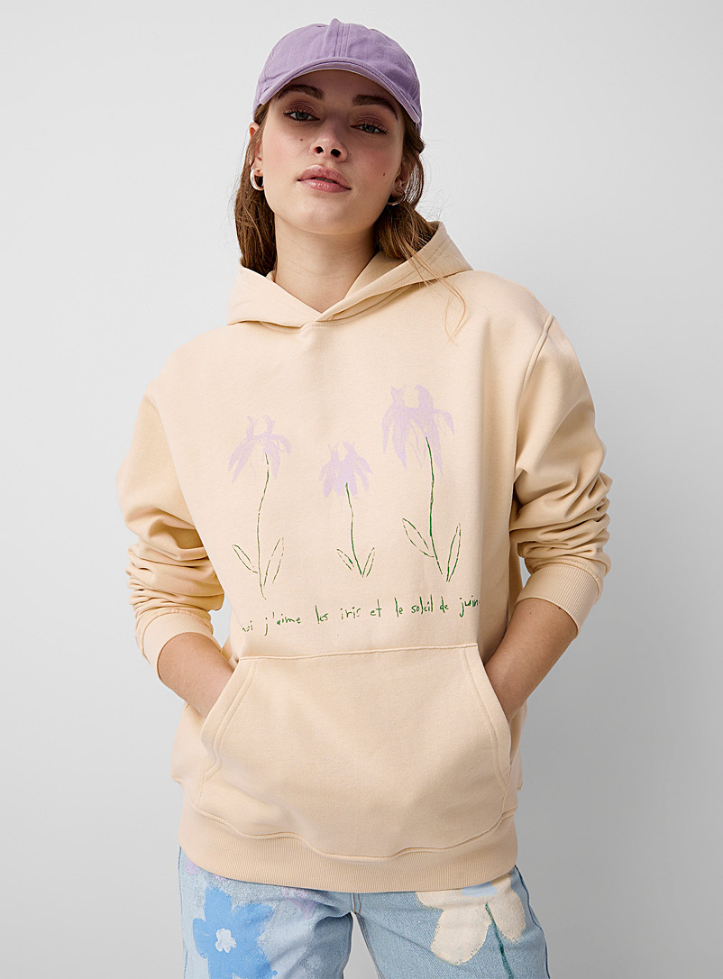 Antoine Saint-Laurent x Twik: Le kangourou fleurs d'iris Beige crème pour femme