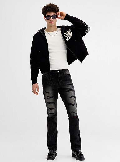 Le jean d&eacute;chir&eacute; noir strass scintillant <b>Coupe droite</b>