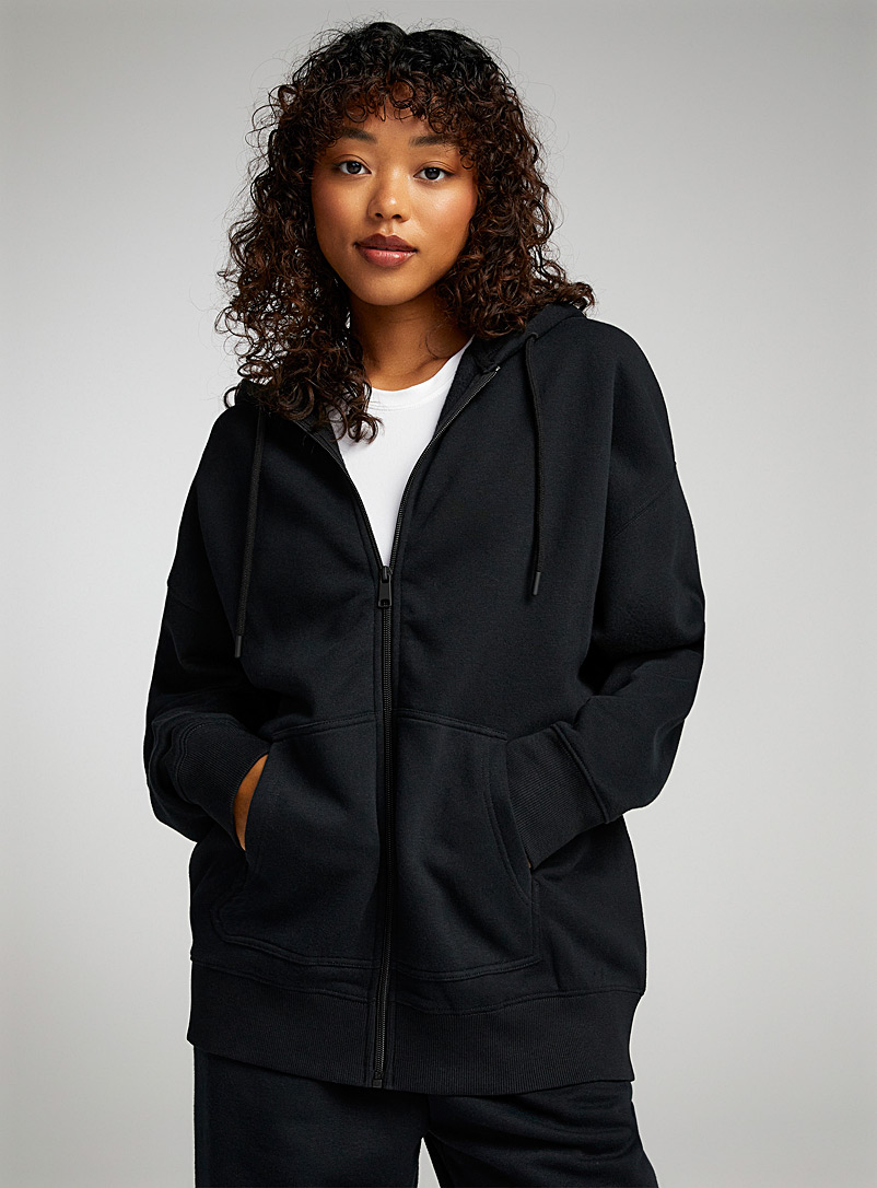 Twik Black Oversized zip-up fleece hoodie for women