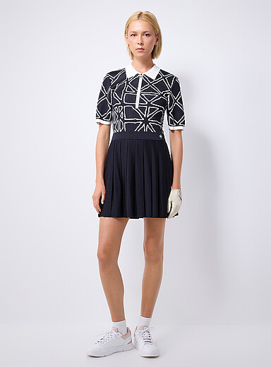 Piqu&eacute;-knit pleated golf dress Built-in shorts
