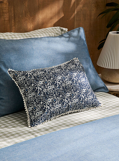 Navy flower embroidered-trim cushion 33 x 45 cm