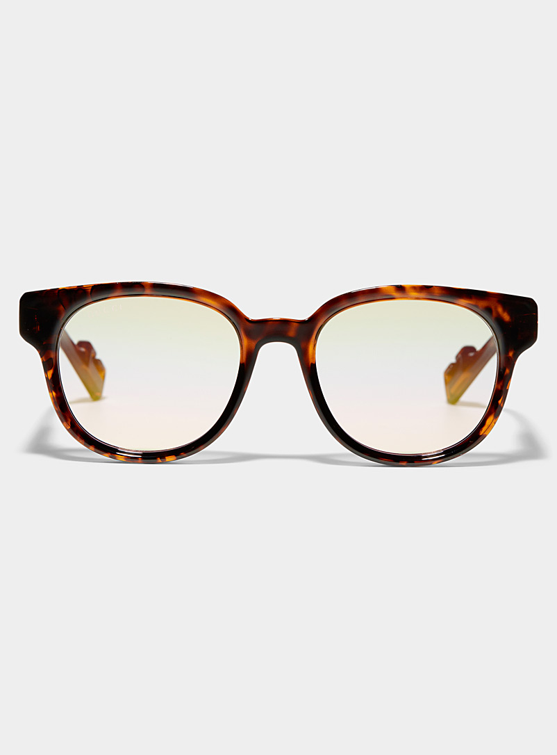 Gucci: Les lunettes de soleil avec bande élastique Brun pour homme