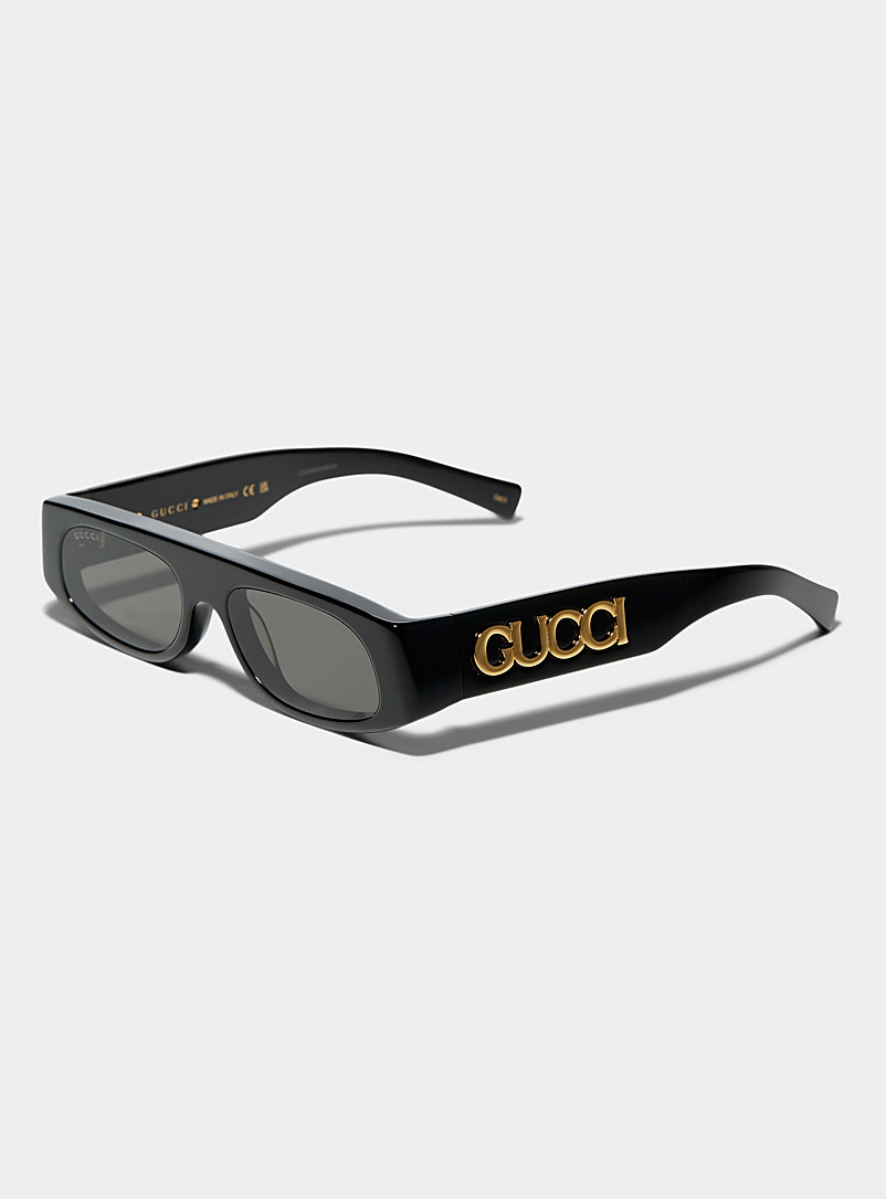 Gucci: Les lunettes de soleil anguleuses signature dorée Noir pour homme